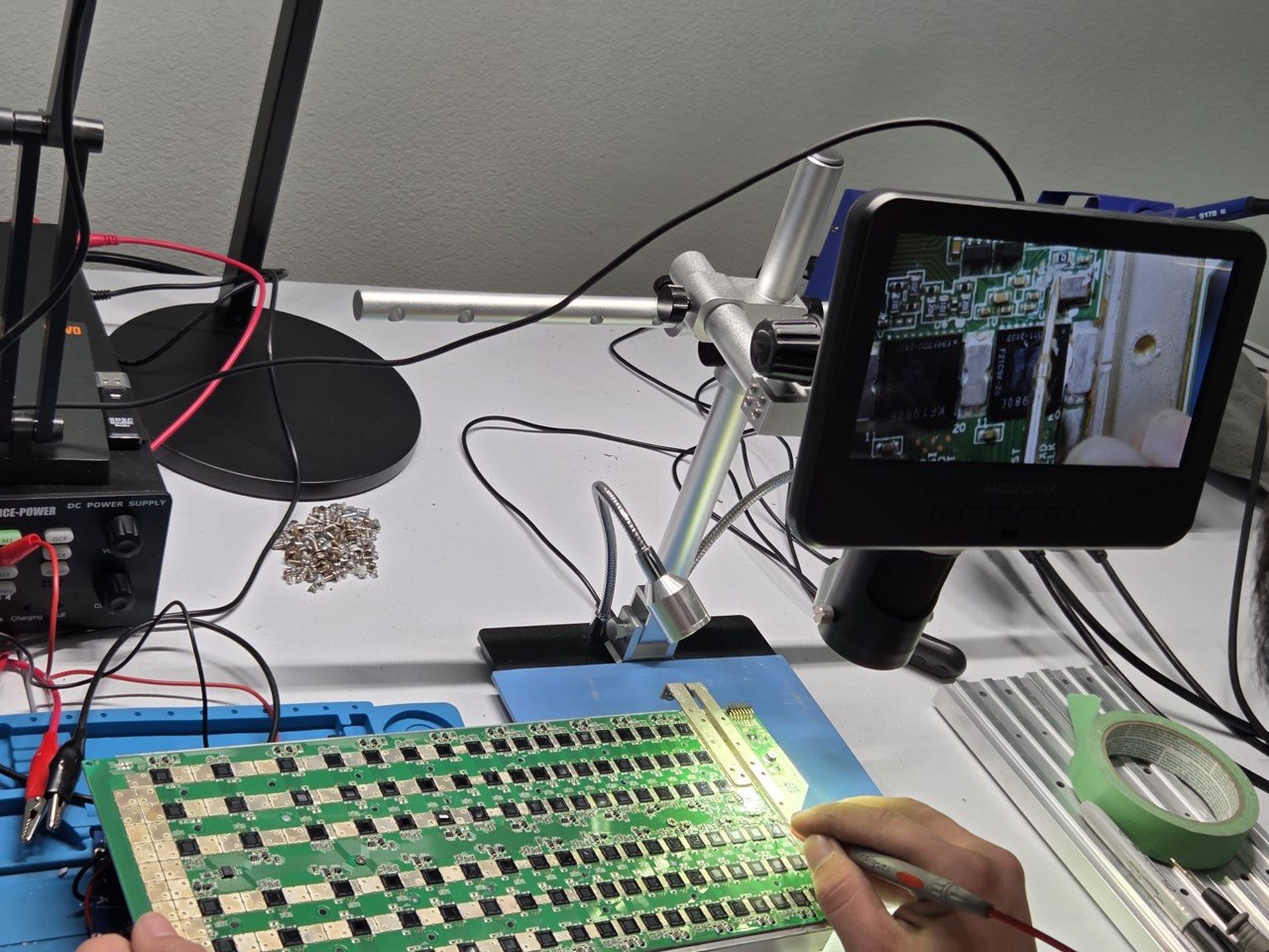 Hashboard under microscope inspection — component-level diagnostics